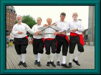 Dancing in the centre of Bristol during Ring Meeting hosted by Bristol Morris Men